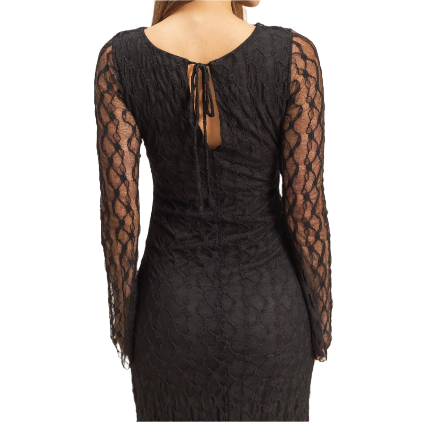 Black lace dress with sheer sleeves on a beige background