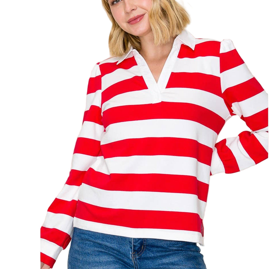 Woman wearing a red and white striped shirt with blue jeans on a beige background