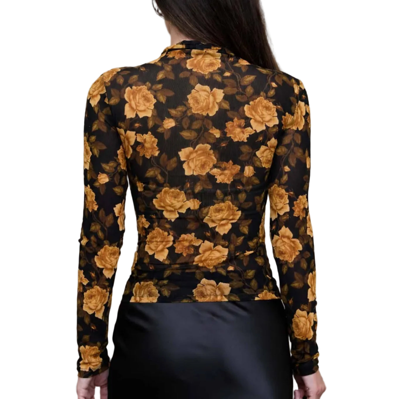 Woman wearing a floral blouse with a plain background
