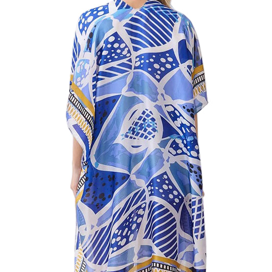 Blue patterned dress on a white background