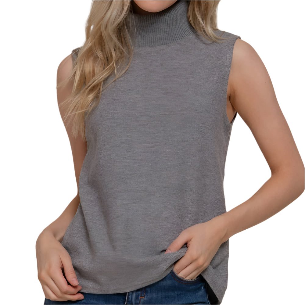 Woman wearing a gray sleeveless turtleneck top against a plain background