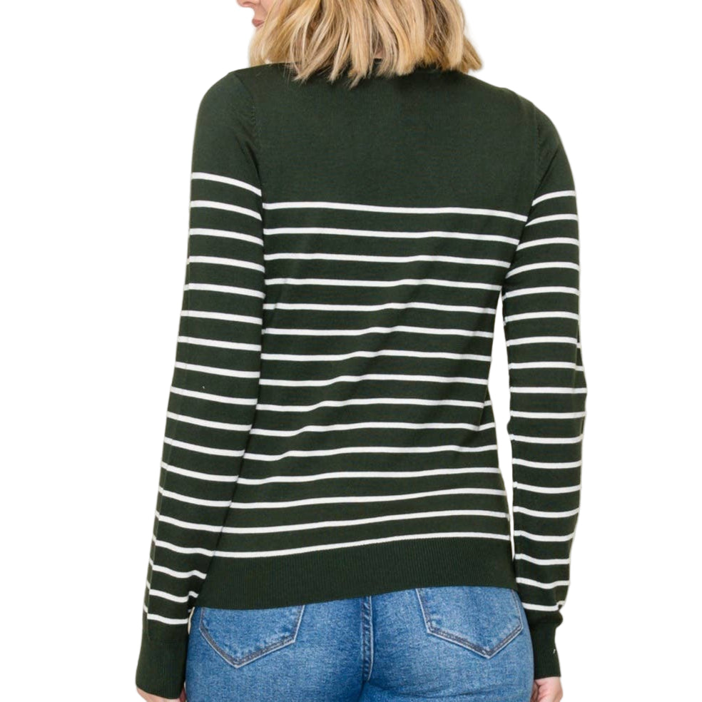 Person wearing a green and white striped sweater against a plain background
