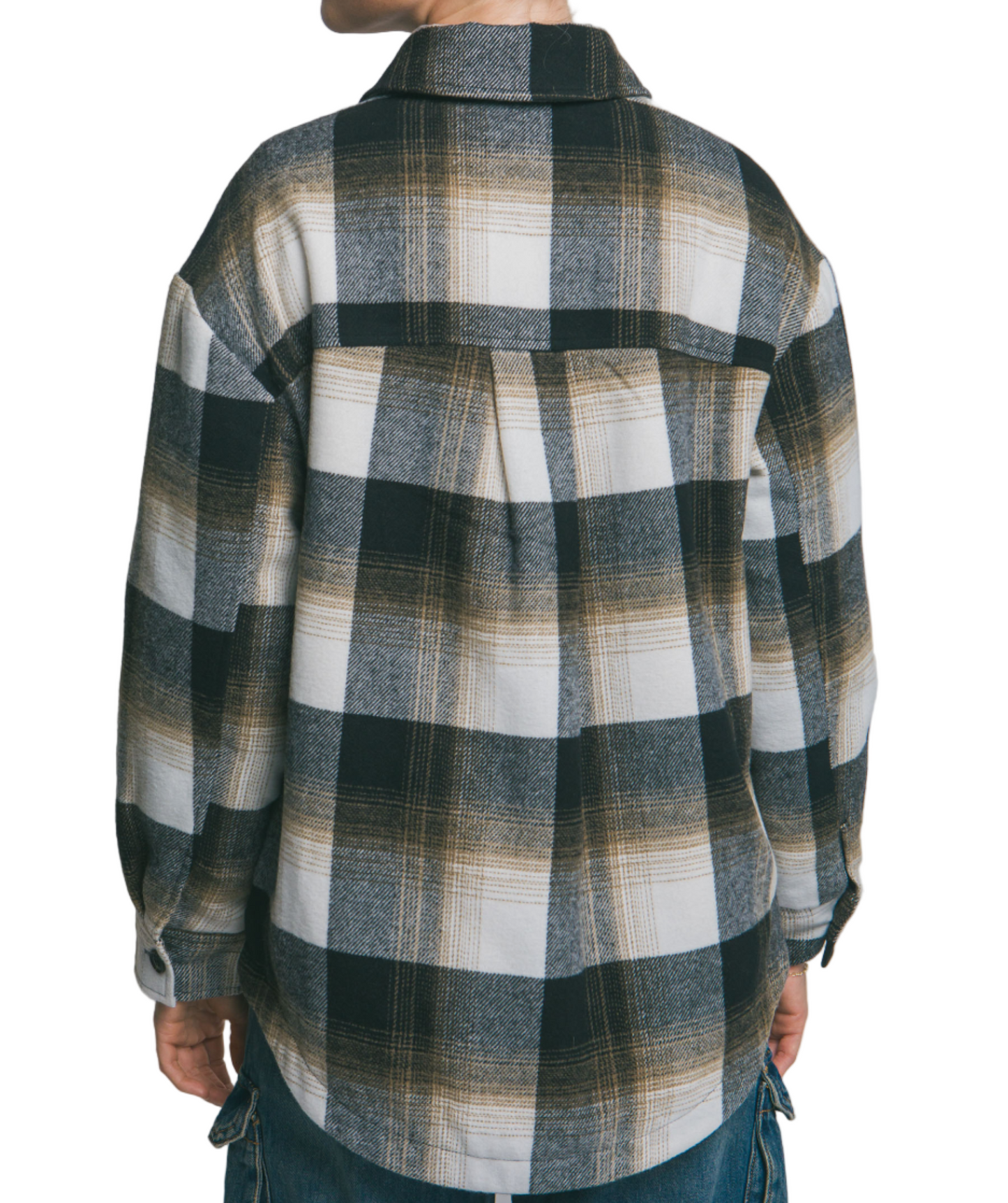 Person wearing a plaid shirt with a neutral background