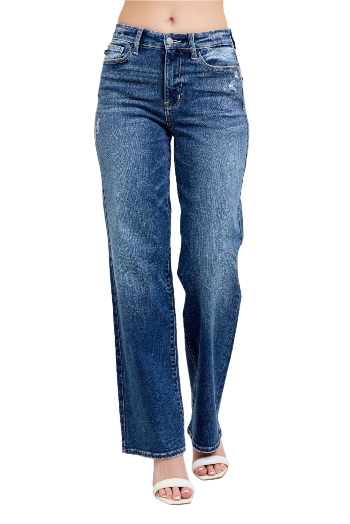 Blue jeans worn by a person on a light gray background