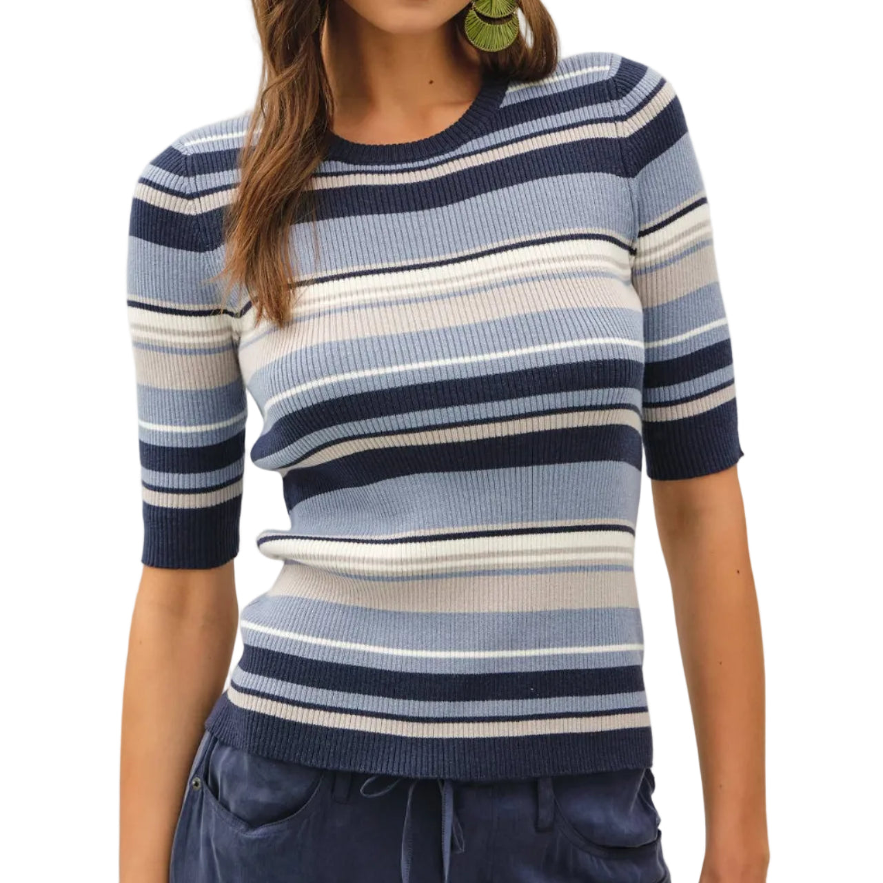 Woman wearing a striped sweater with a plain background
