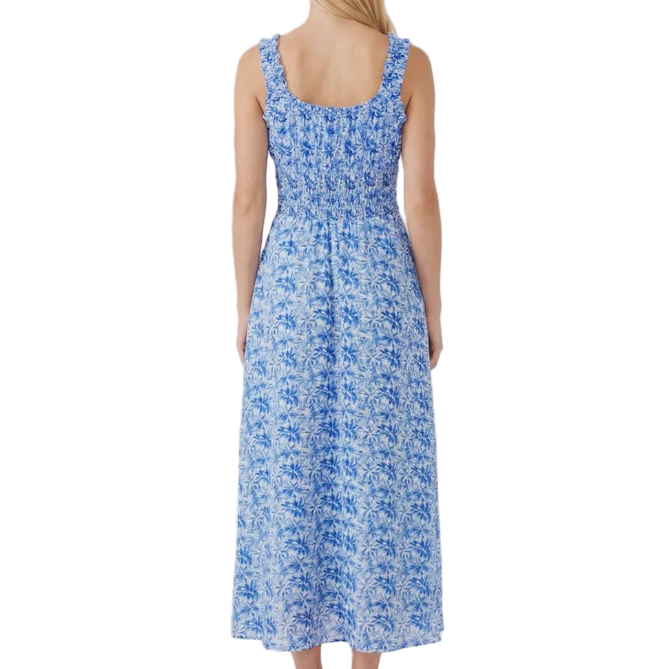 Woman wearing a blue floral dress on a white background