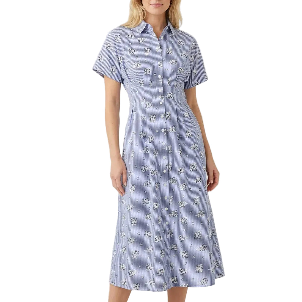 Woman wearing a blue floral dress on a white background