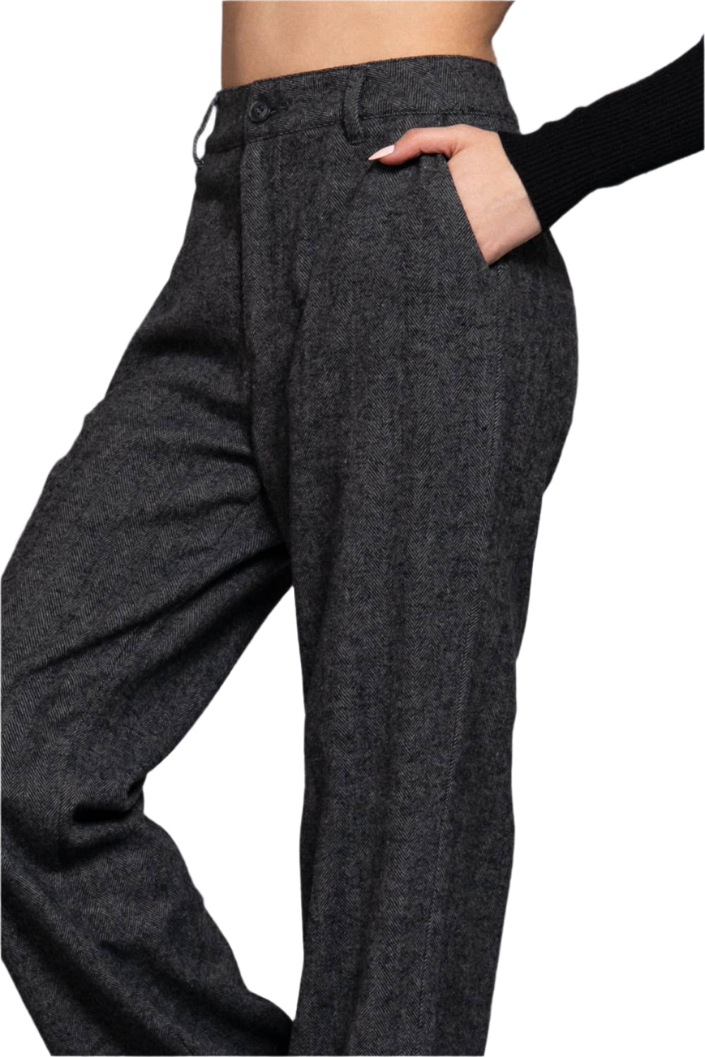 Dark gray textured pants worn by a person on a gray background