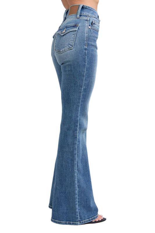 Blue flared jeans on a white background