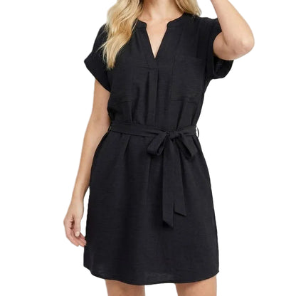 Woman wearing a black dress on a white background