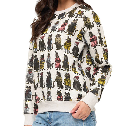 Woman wearing a sweater with cat pattern on a white background