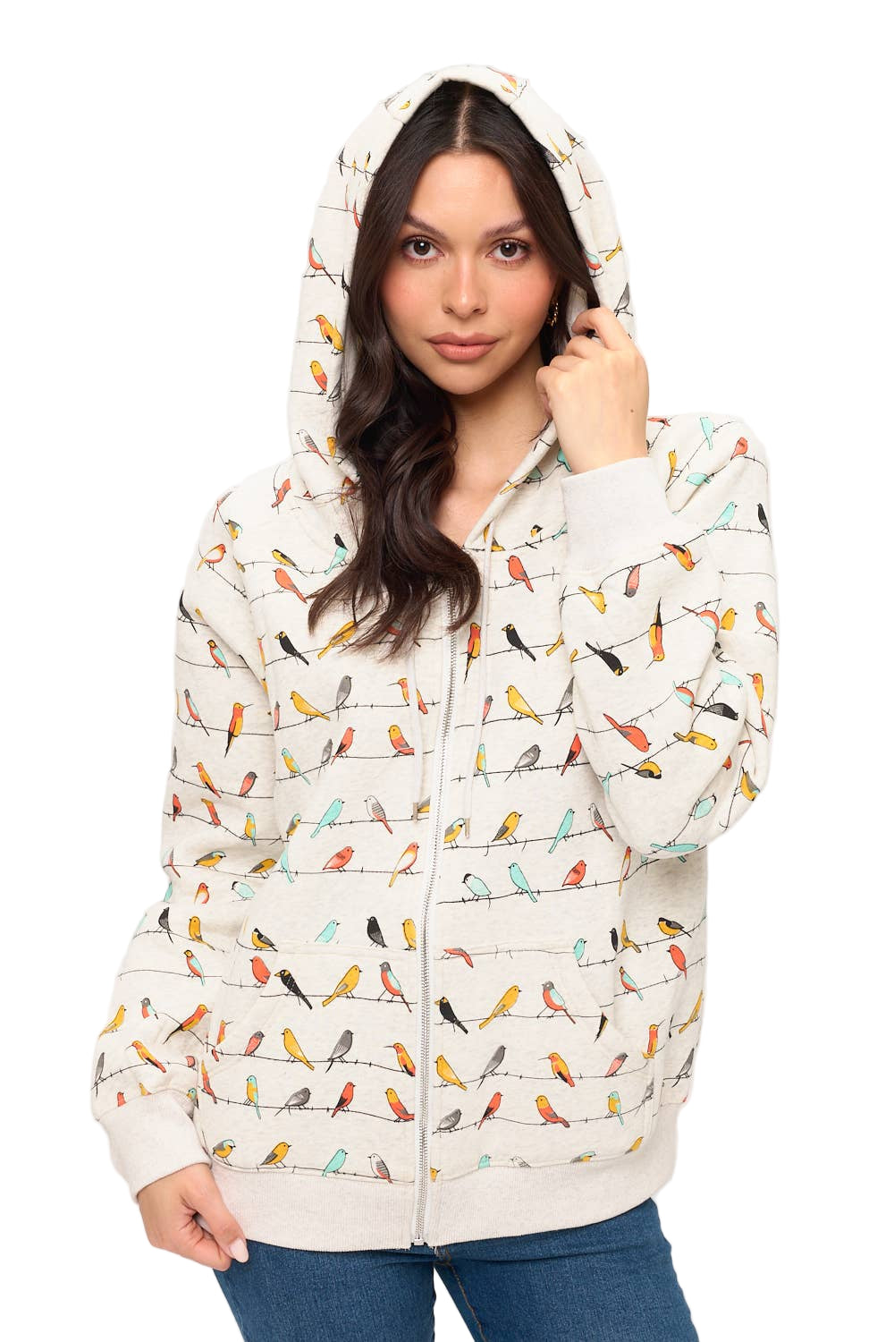 Woman wearing a hoodie with bird pattern on a white background