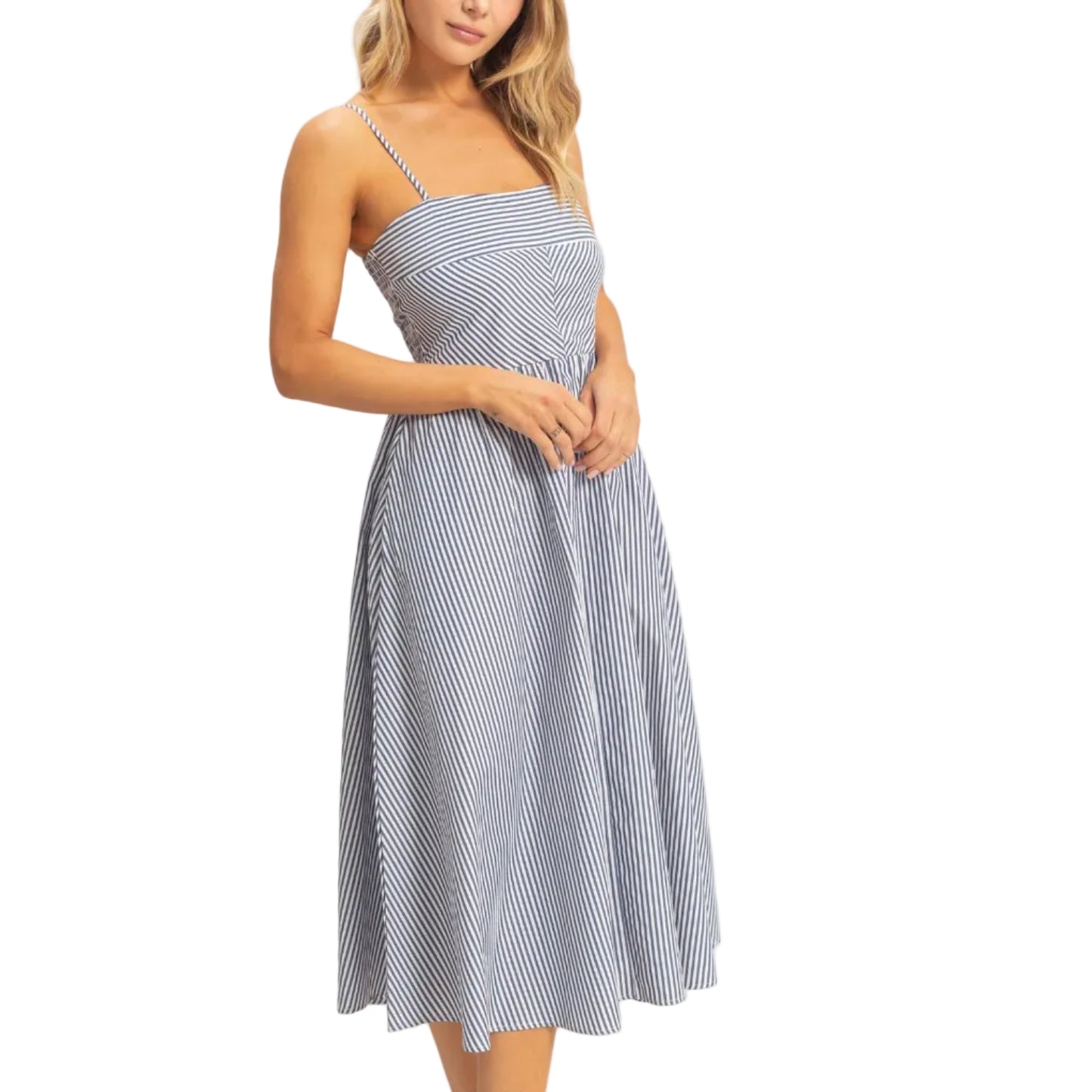Woman wearing a blue and white striped dress on a plain background
