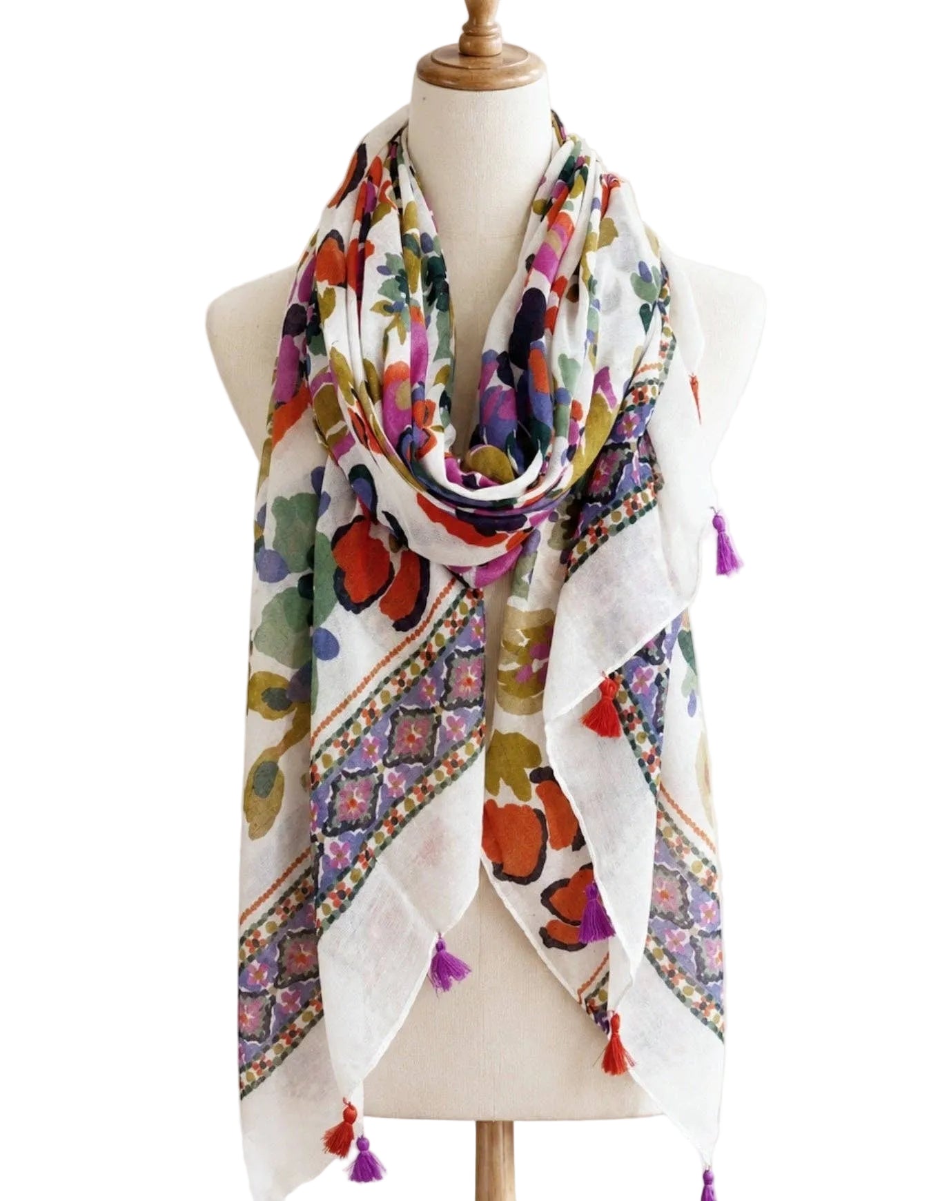 Colorful floral scarf on a mannequin with a white background