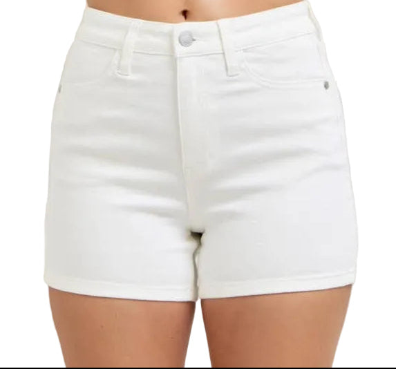 White denim shorts worn by a person on a plain background