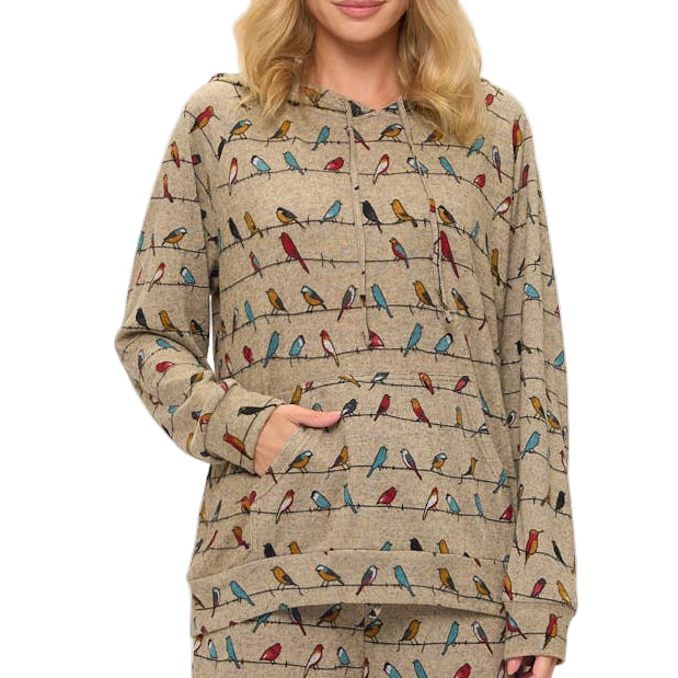 Woman wearing a patterned pajama set on a white background