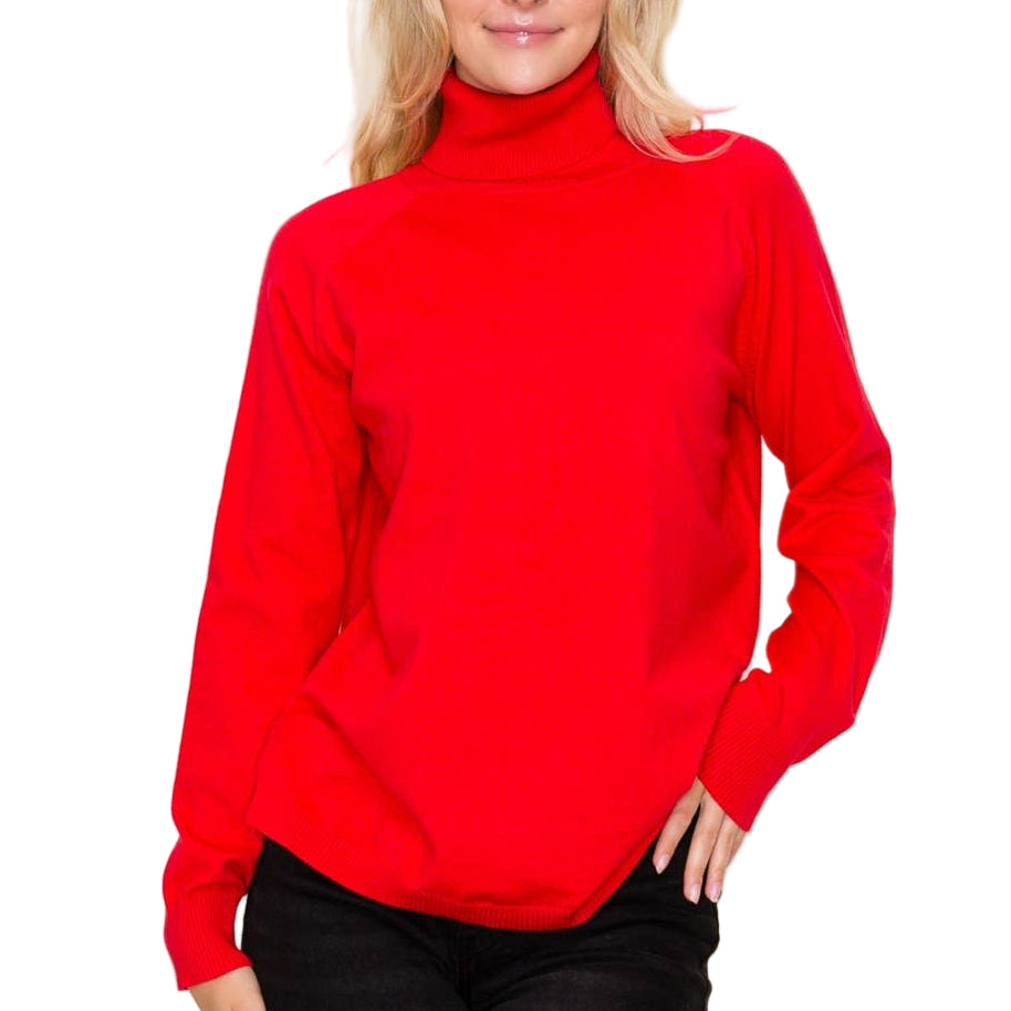 Woman wearing a red turtleneck sweater against a plain background