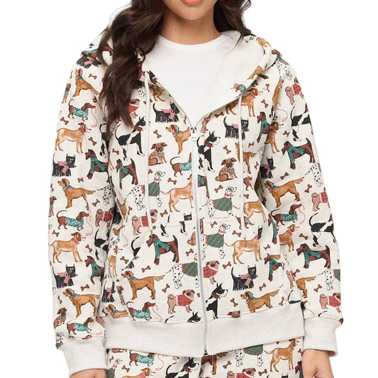 Woman wearing a pajama set with dog pattern on a white background