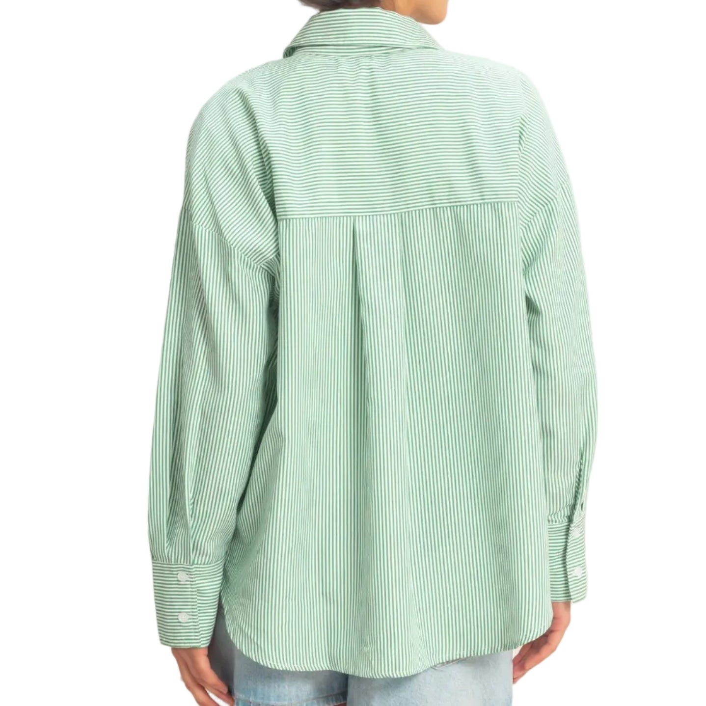 Person wearing a green checkered shirt on a plain background