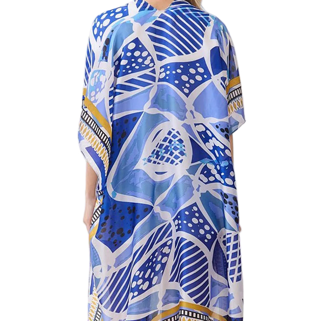 Blue patterned dress on a white background