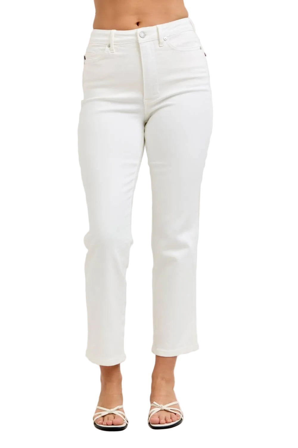 White jeans worn by a person on a plain background