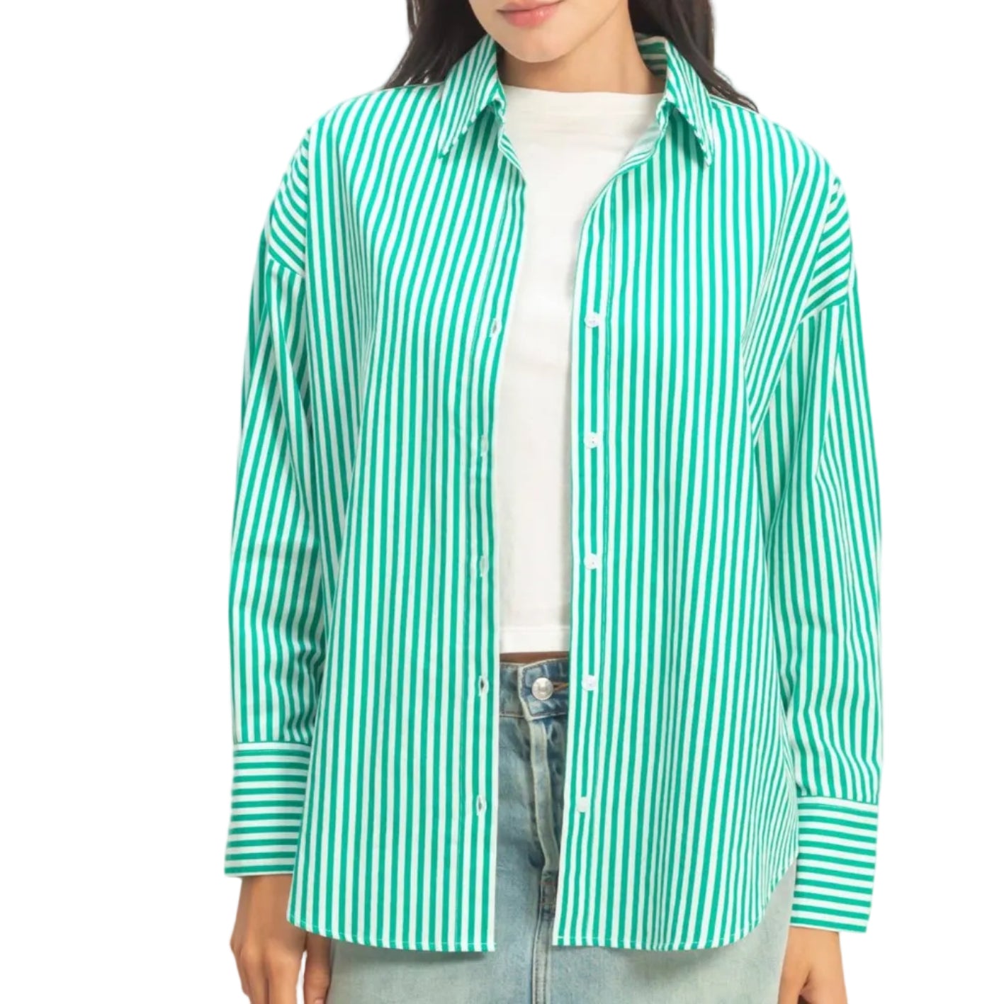 Woman wearing a green and white striped shirt on a plain background