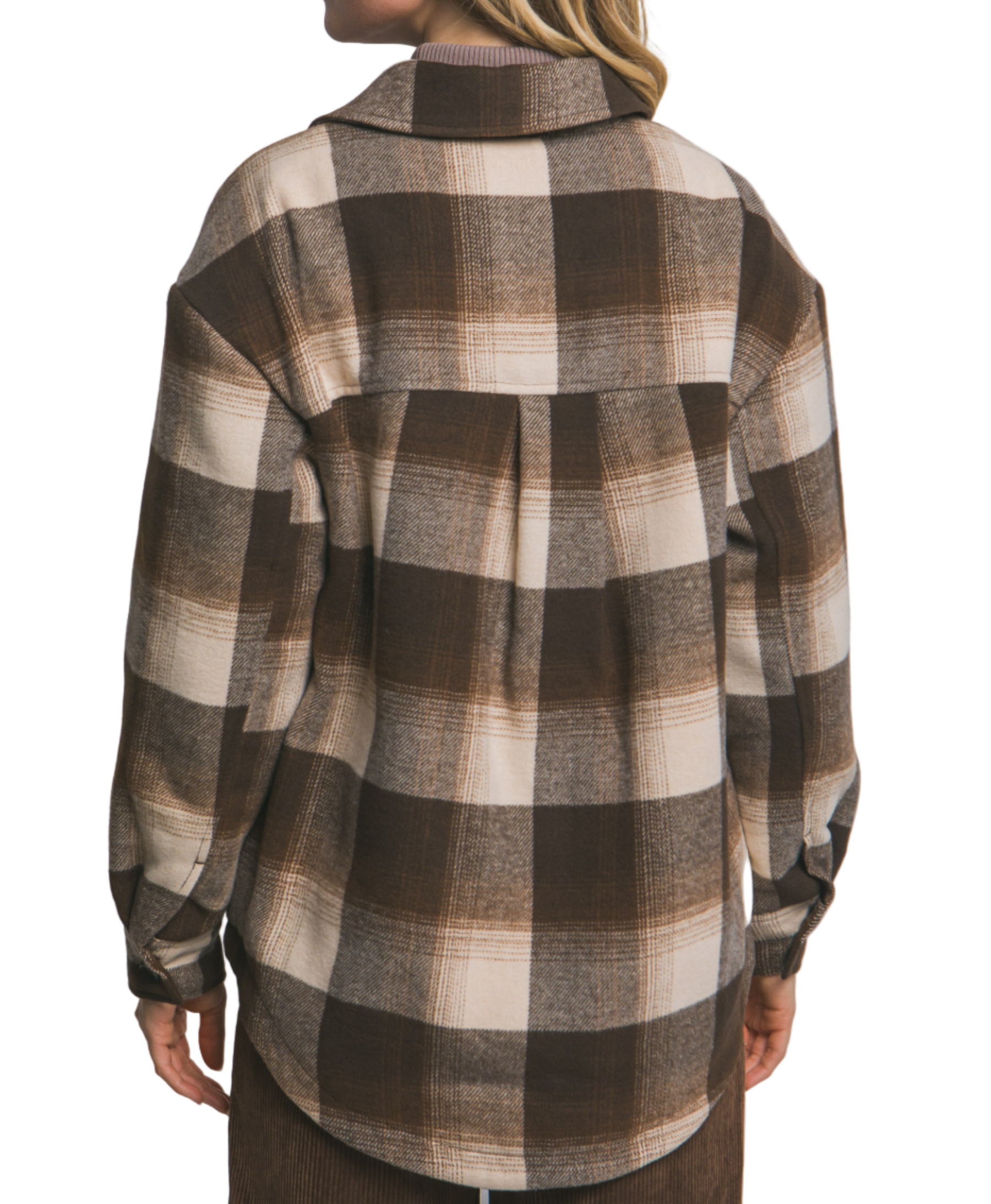 Person wearing a brown and beige checkered shirt against a plain background