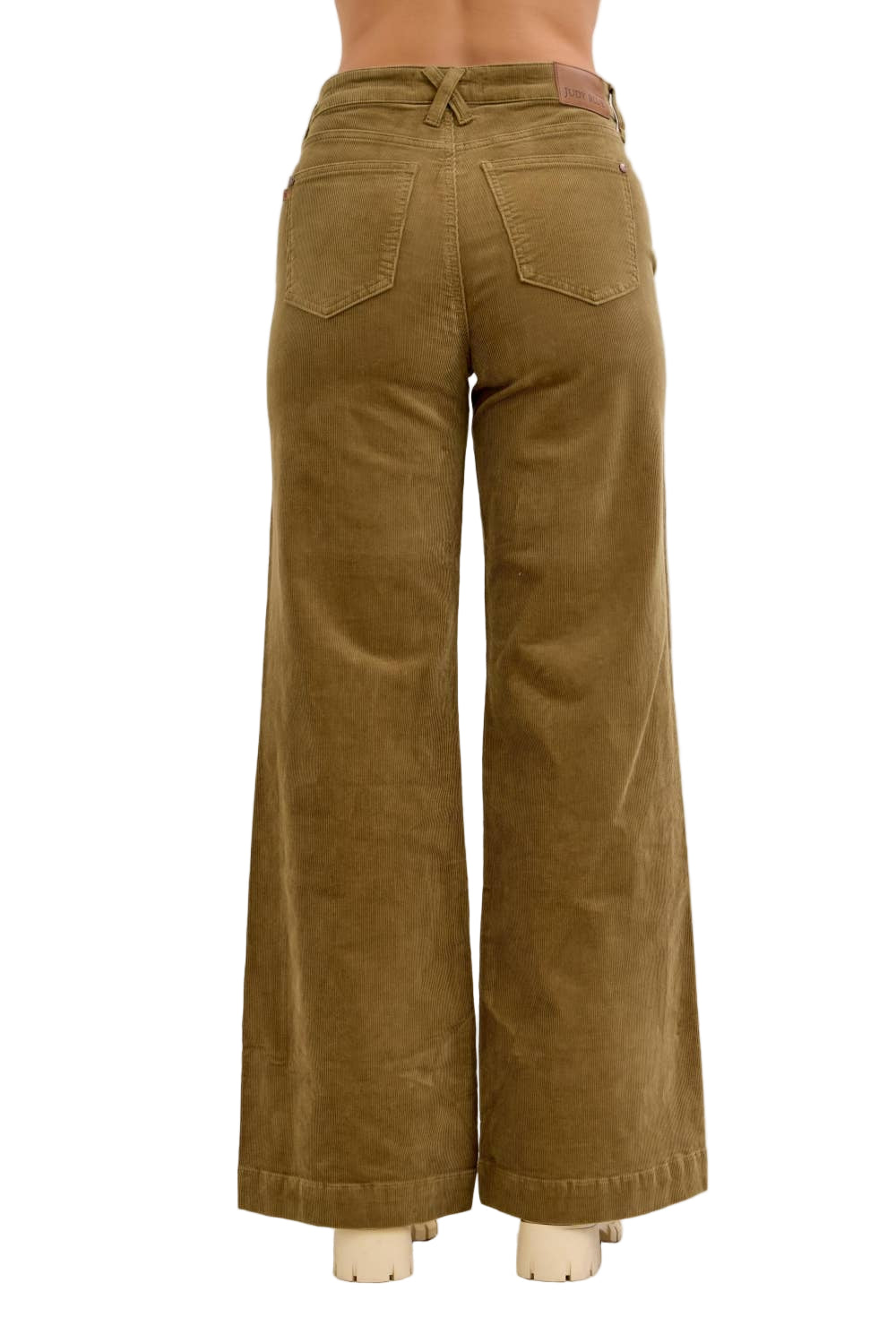Brown corduroy pants on a white background