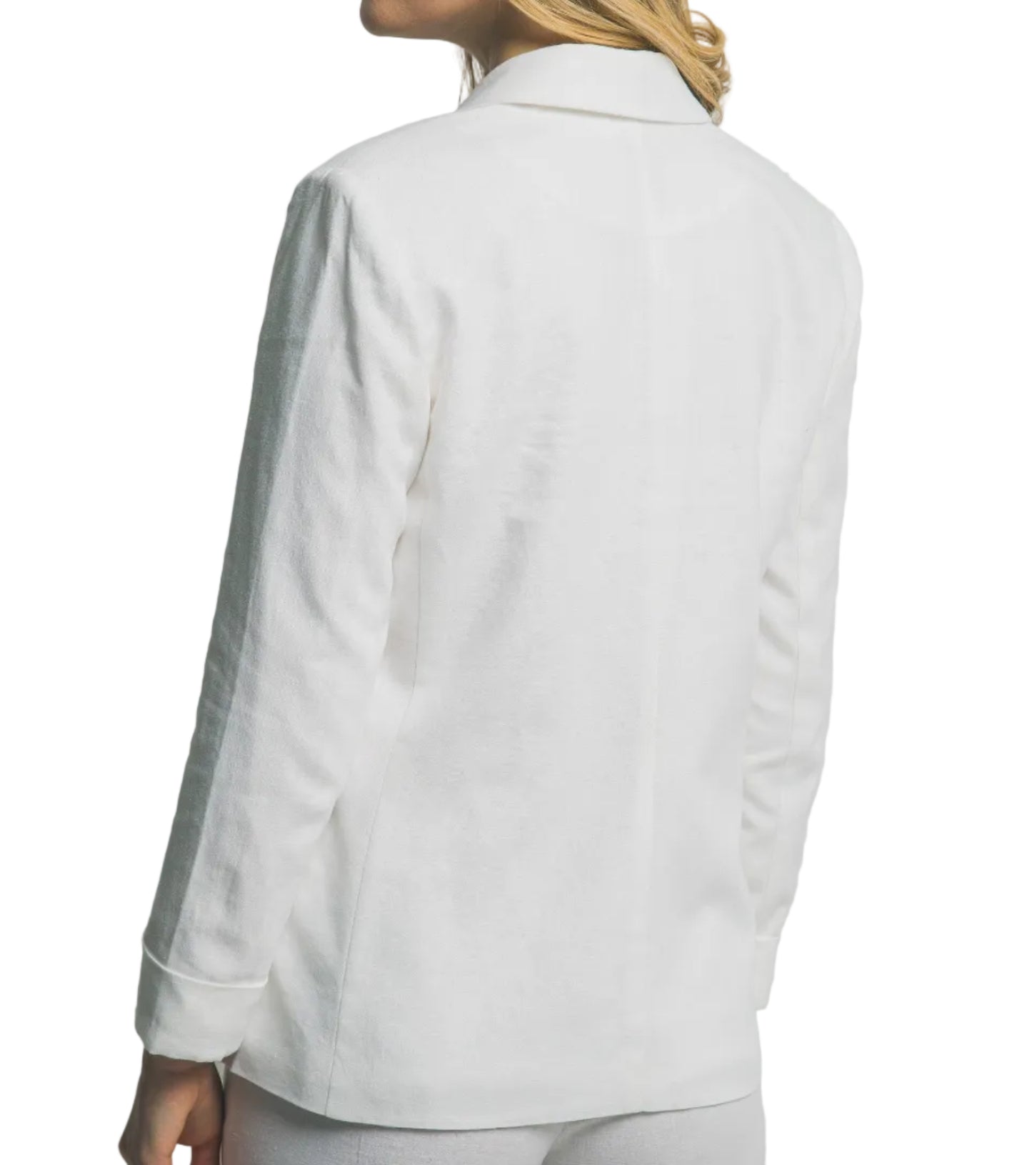 Woman wearing a white blazer with gray trim on a plain background
