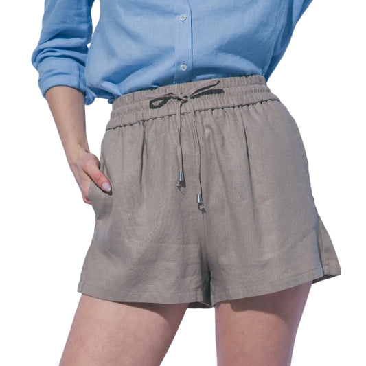 Person wearing brown shorts and a blue shirt against a light gray background