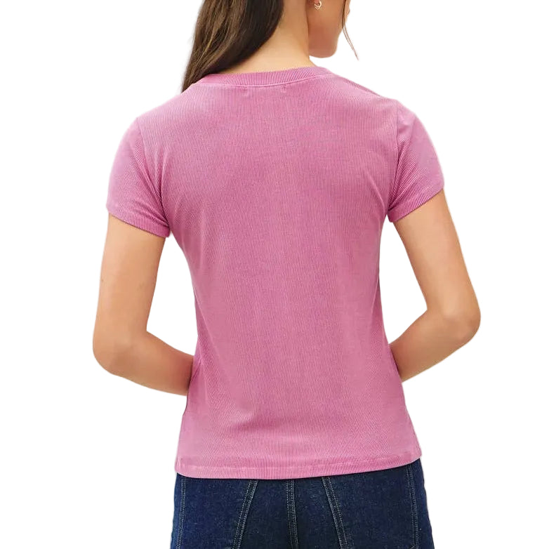 Person wearing a pink shirt and blue jeans on a white background