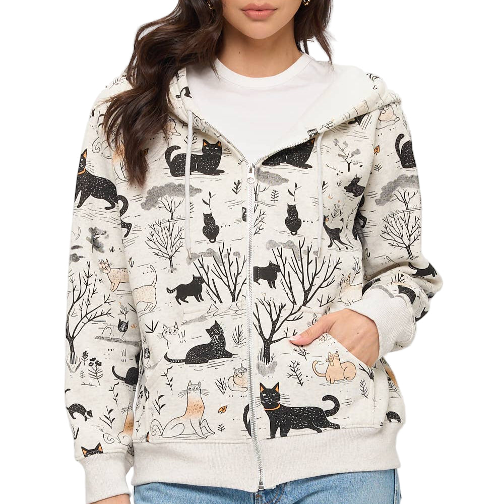 Woman wearing a hoodie with cat pattern on a white background