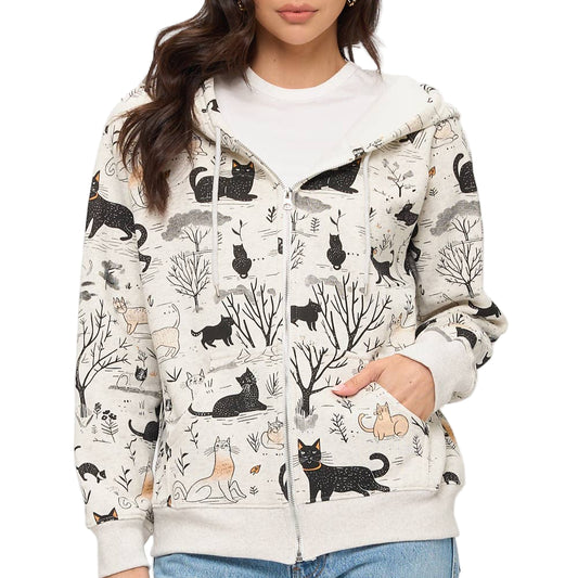 Woman wearing a hoodie with cat pattern on a white background