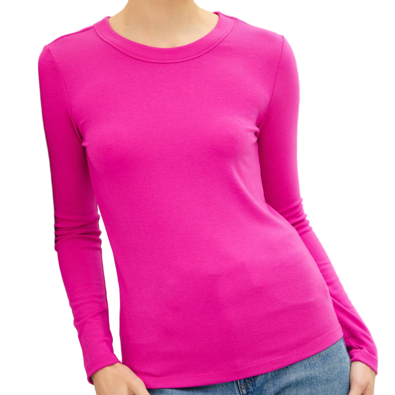 Woman wearing a bright pink long-sleeve shirt against a black background