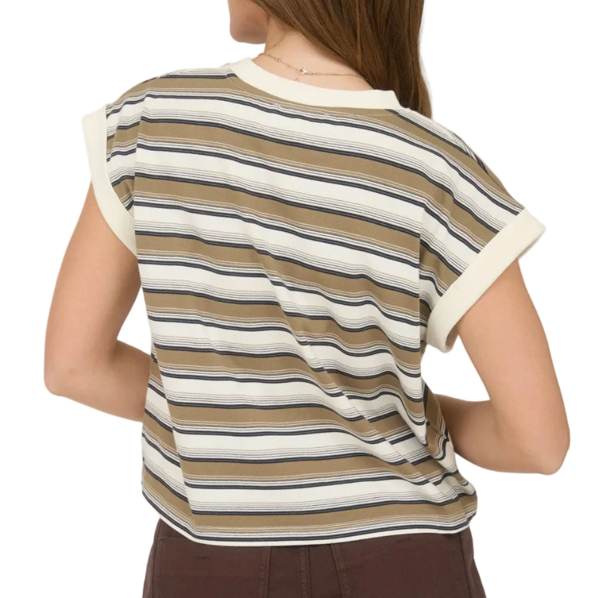 Woman wearing a striped shirt and brown shorts on a plain background
