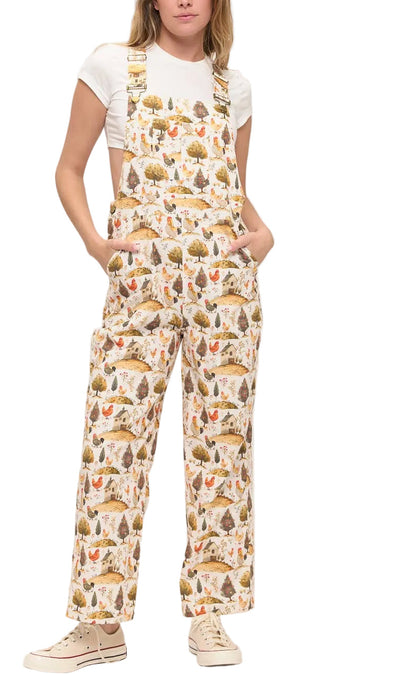 Person wearing a patterned overalls on a white background