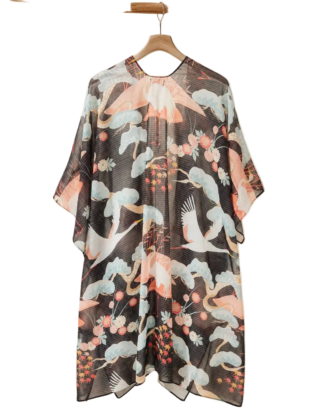 Floral patterned dress on a hanger with a neutral background