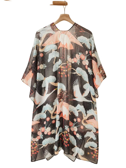 Floral patterned dress on a hanger with a neutral background
