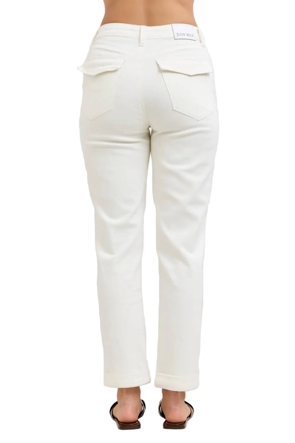 White jeans on a plain background