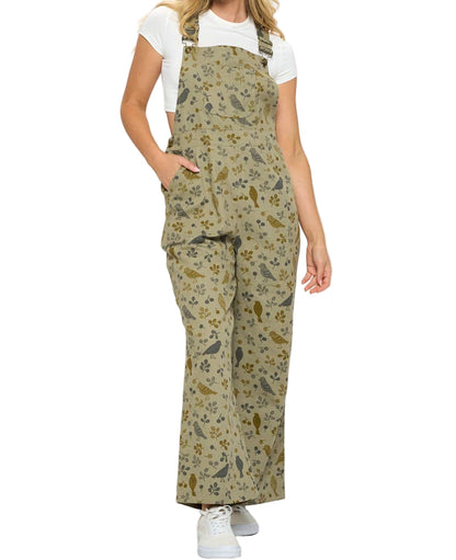Woman wearing a floral patterned overalls on a white background