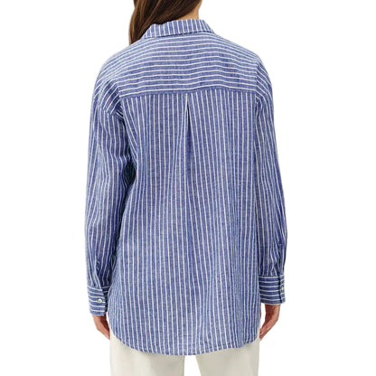 Person wearing a blue striped shirt and white pants on a white background