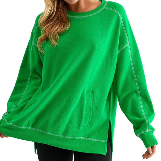 Person wearing a green sweatshirt on a white background