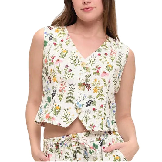 Woman wearing a floral outfit on a white background