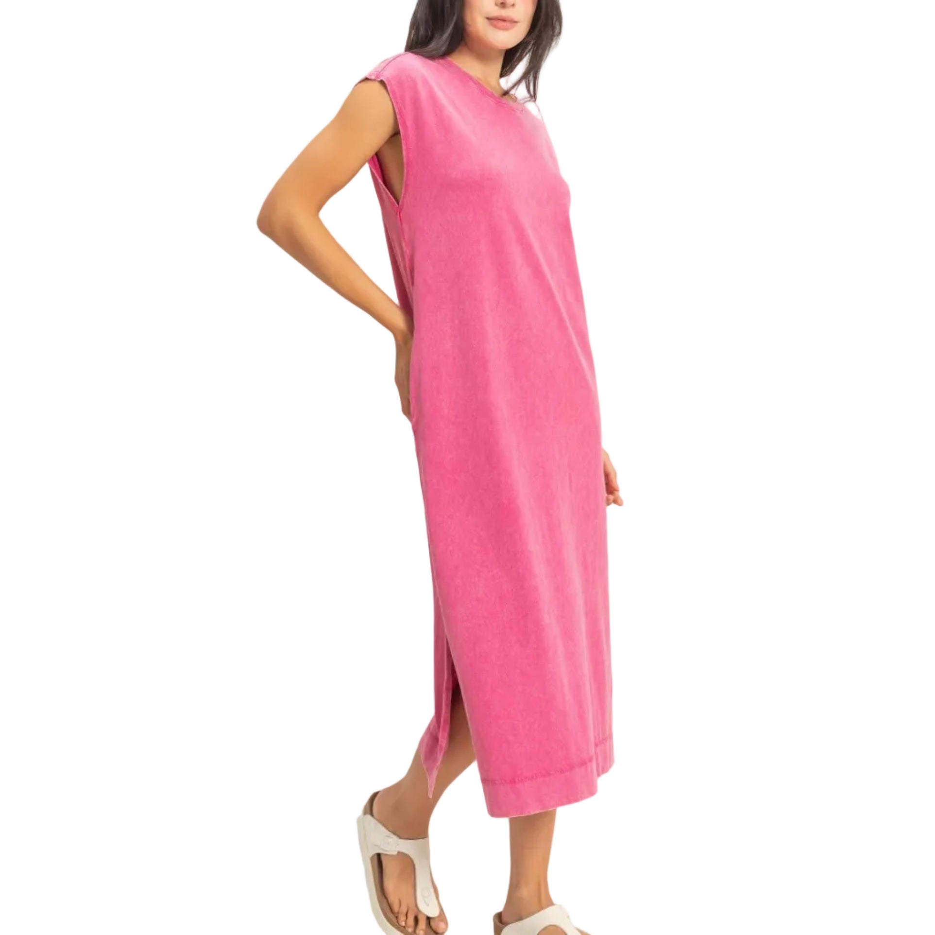 Woman wearing a pink dress against a white background