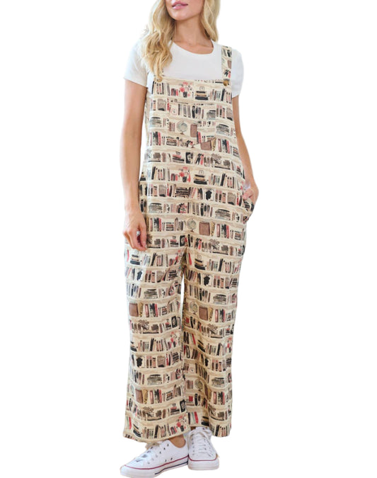 Woman wearing a patterned overalls in a living room setting