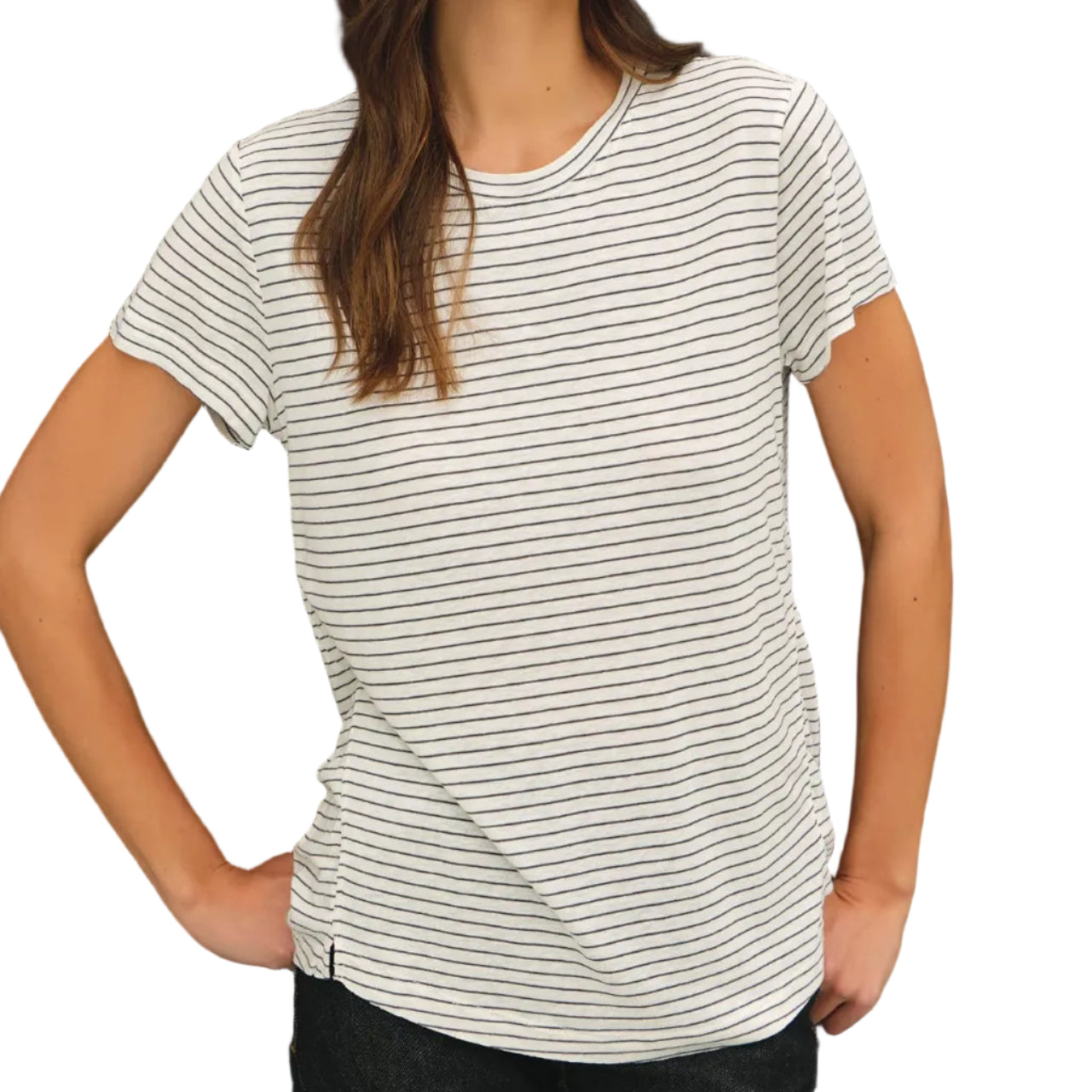 Woman wearing a striped t-shirt against a black background
