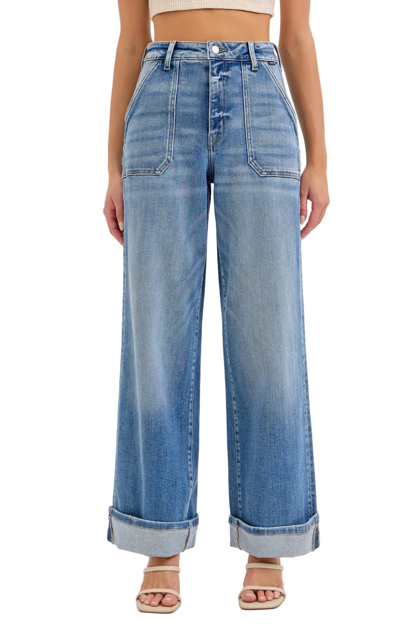 Wide-leg jeans worn by a person on a light gray background