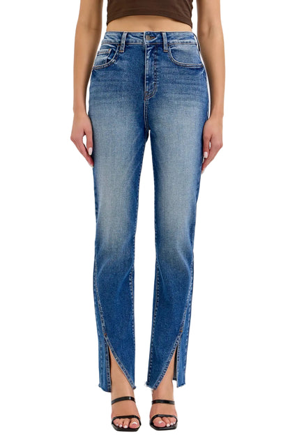 Blue jeans with a slit design worn by a person on a white background