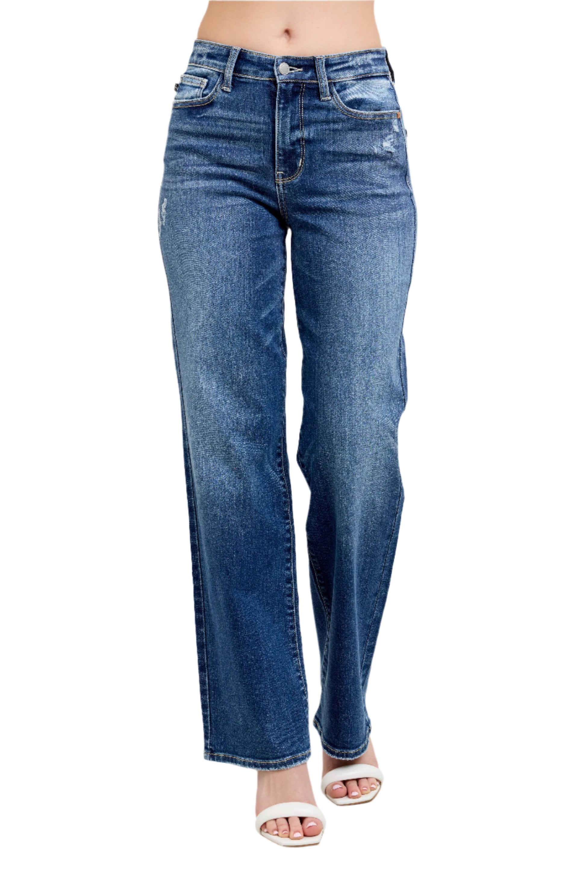 Blue jeans worn by a person on a light gray background