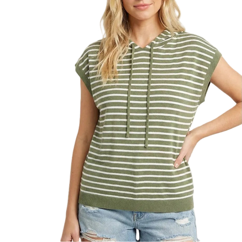 Woman wearing a green and white striped sleeveless hoodie with a beige background